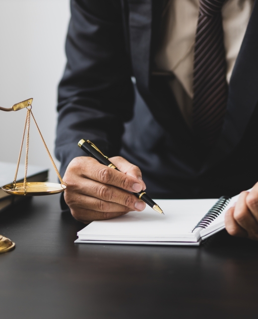 Concept of legal justice. Lawyer is working in a law firm. Abu Dhabi Criminal Lawyers